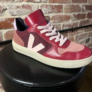 Worn a couple of times. Scratch in the front of one shoe look at pics.